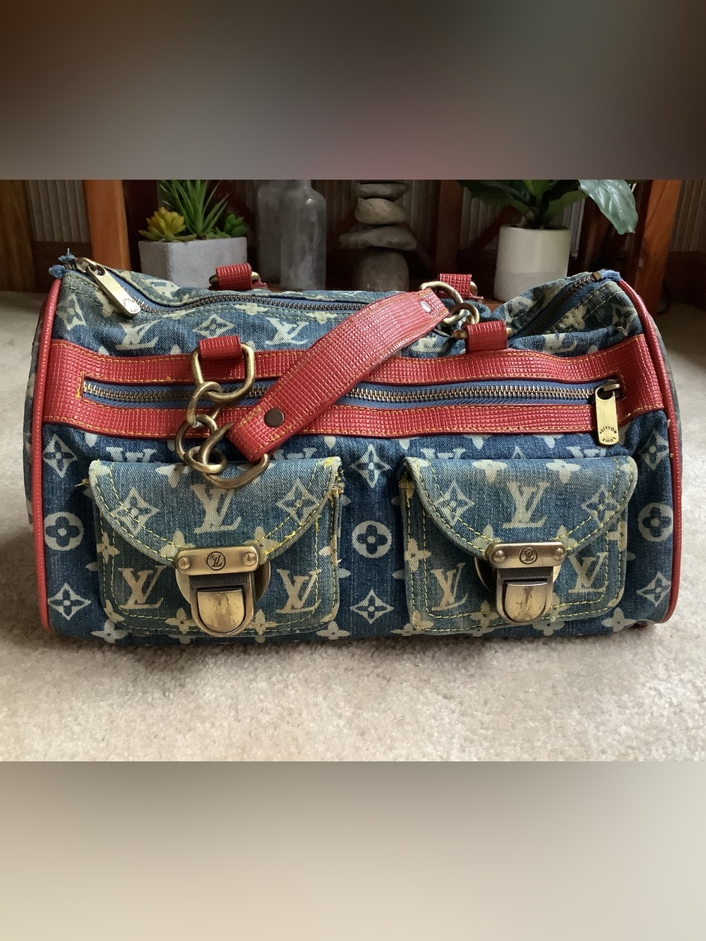 Denim and white, handbag. Red trim.  Signs of use.